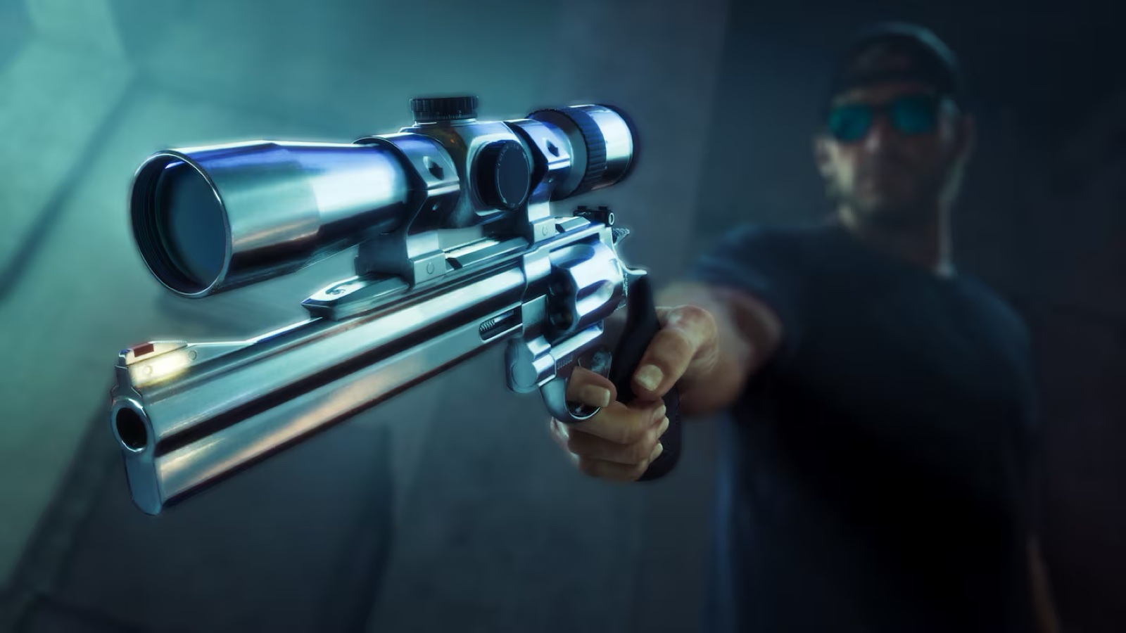 A scoped revolver with a stainless finish held in a hand